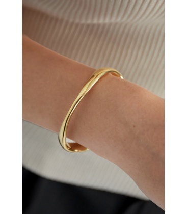 Stijlvolle goudkleurige bangle armband voor elke gelegenheid