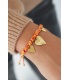 Oranje met goudkleur geknoopte armband met bedels